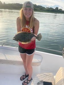 Flounder smiles and fishing tales!
