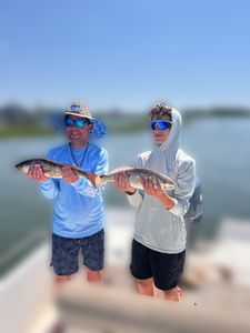 Two people fishing in NC