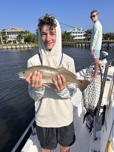 Big redfish bagged while deep sea trolling on a clear day!