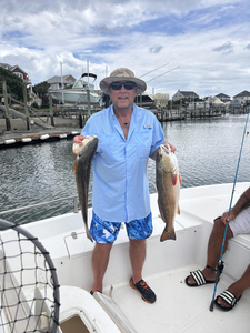 Reeled in a couple of feisty redfish with a deep sea trolling technique in Wilmington, NC.