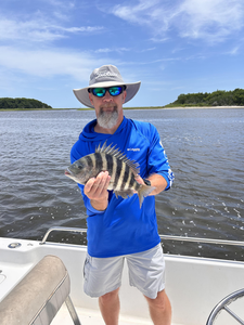 A feisty sheepshead hauled in on a deep sea trolling adventure in Wilmington, NC!