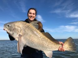 Angler with a big black drum fish caught in TX