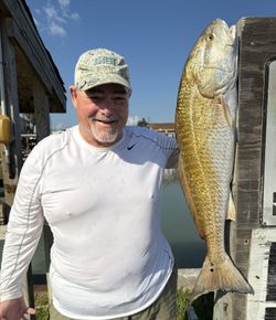 Angler fishing in Port Isabel