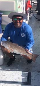 One angler fishing at Port Isabel