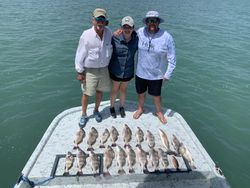 3 people fishing in TX