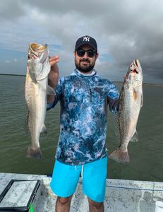 2 spotted weakfish, fishing in TX