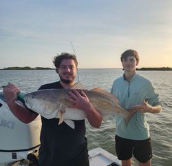 Two anglers with a big 29-inch fish in Texas