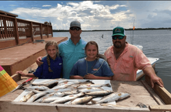 4 people fishing at Oak Hill