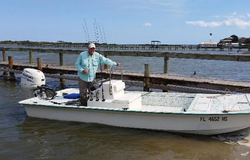 Angler with fishing rod enjoying the outdoors in Oak Hill