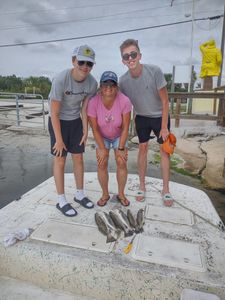Three people fishing in FL