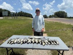 A lone fisherman at Cedar Shores