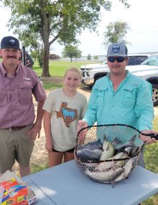 3 people fishing in TX