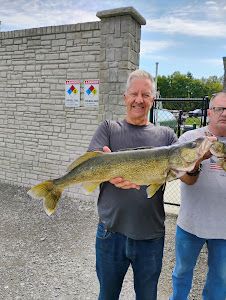 Two anglers enjoying a fishing trip in OH