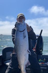 Angler with a 36-inch fish in WA