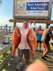 Two anglers fishing at Gulf Shores