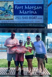 4 anglers with a huge 26-inch catch in Gulf Shores