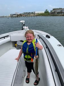 A person fishing in Gulf Shores