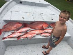Red snapper fishing catch displayed in boat at Gulf Shores AL
