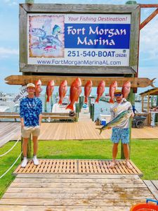 Fresh caught red snapper and mahi mahi displayed at Fort Morgan Marina in Gulf Shores AL