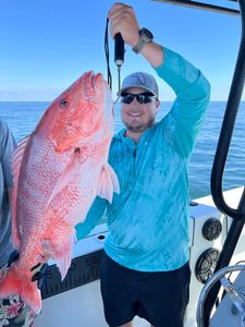 1 fisherman reeling in a 28-inch catch in AL
