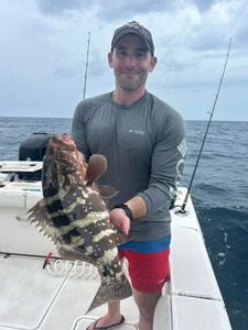 Angler holding a 20-inch fish in FL