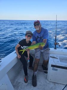 Two anglers with their caught fish in Key West