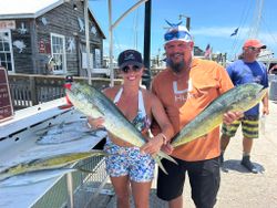 3 people fishing for 2 big fish in Key West