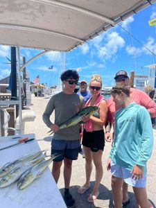 5 people fishing in FL with 2 small fish