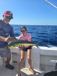 Angler holding a 28-inch fishing catch in FL