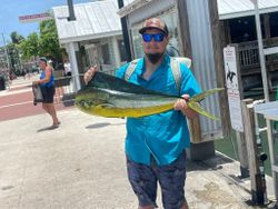 Three anglers with one big fish in Key West