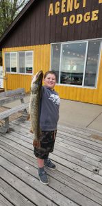 Angler holding a 30-inch Northern Pike in MN