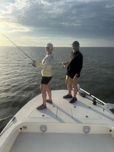 Two people fishing at Aransas Pass