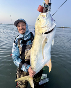 A lone angler fishing in Aransas Pass