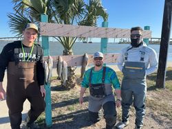 Three anglers fishing at Aransas Pass