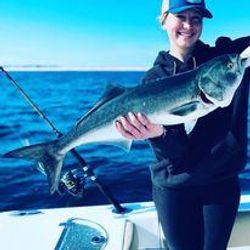 Angler with 28-inch fish in Bourne