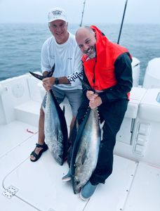 Two people fishing in MA