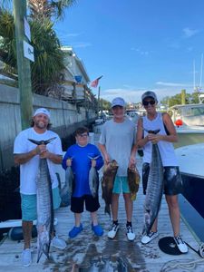 4 anglers with a great catch of 4 fish in SC