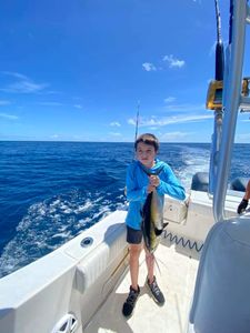 Angler catching a 15-inch fish in South Carolina