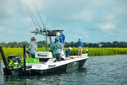 Three people fishing at Murrells Inlet