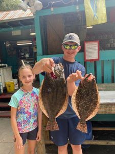 Two summer flounder caught in Murrells Inlet