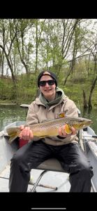Casting for trout in clear water