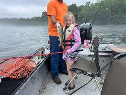 Angler with rainbow trout catch in AR