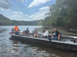 5 people fishing in Cotter