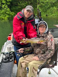 Two anglers enjoying a fishing trip in Cotter