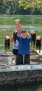 Two people fishing in Cotter