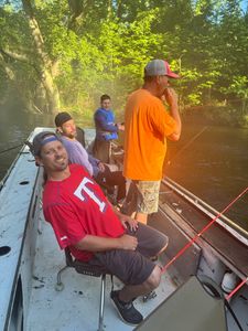 Four friends enjoying fishing in Cotter