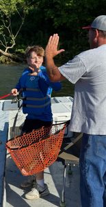 Two people fishing in Cotter