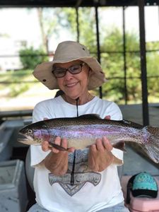 A rainbow trout caught in Cotter, measuring 18 inches