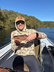 Angler fishing for rainbow trout in AR