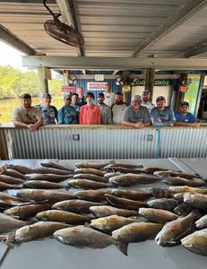 A group of 14 people fishing in LA
